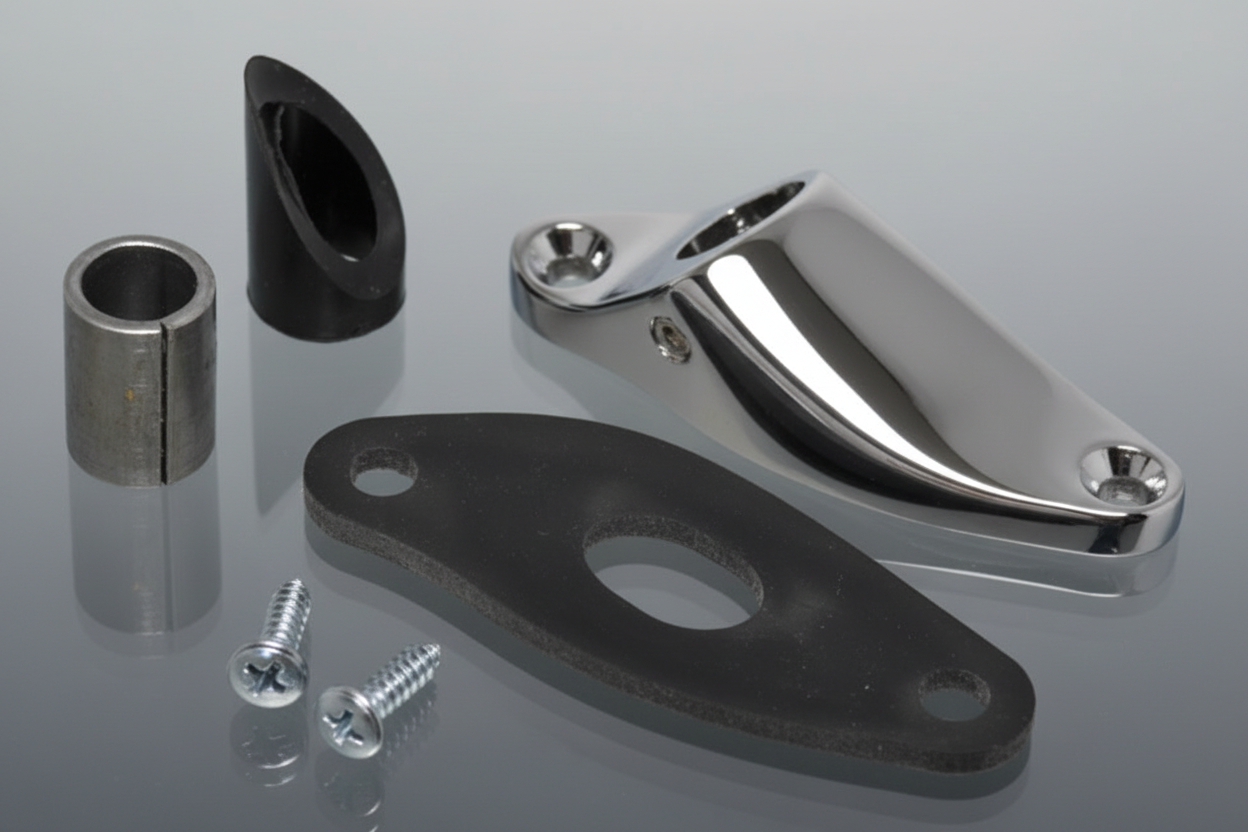 An installation kit for a spotlight, including components such as a mounting bracket, gasket, fasteners, and template.