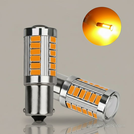 Two amber-colored LED twist lock replacement bulbs for vehicle lightbars, with the brand logo 'LIGHTBARPARTS' visible on the image.
