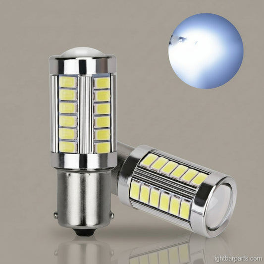 Two LED twist lock replacement bulbs for vehicle lightbars, bright white color, with visible LED components inside a silver metal casing.